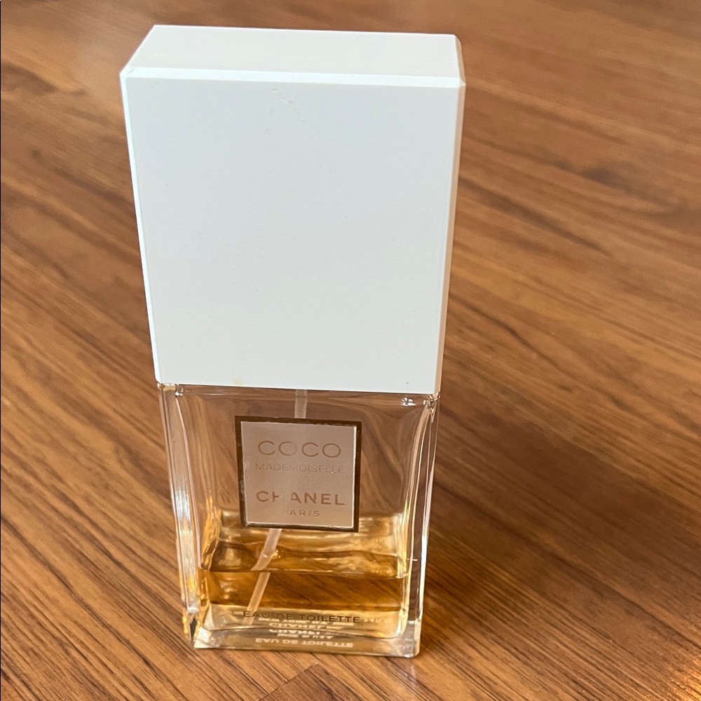 CHANEL Coco Mademoiselle with White Cap and Gold Hue